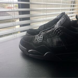 Jordan Black Sneakers Air Jordan 4 Sleek Design